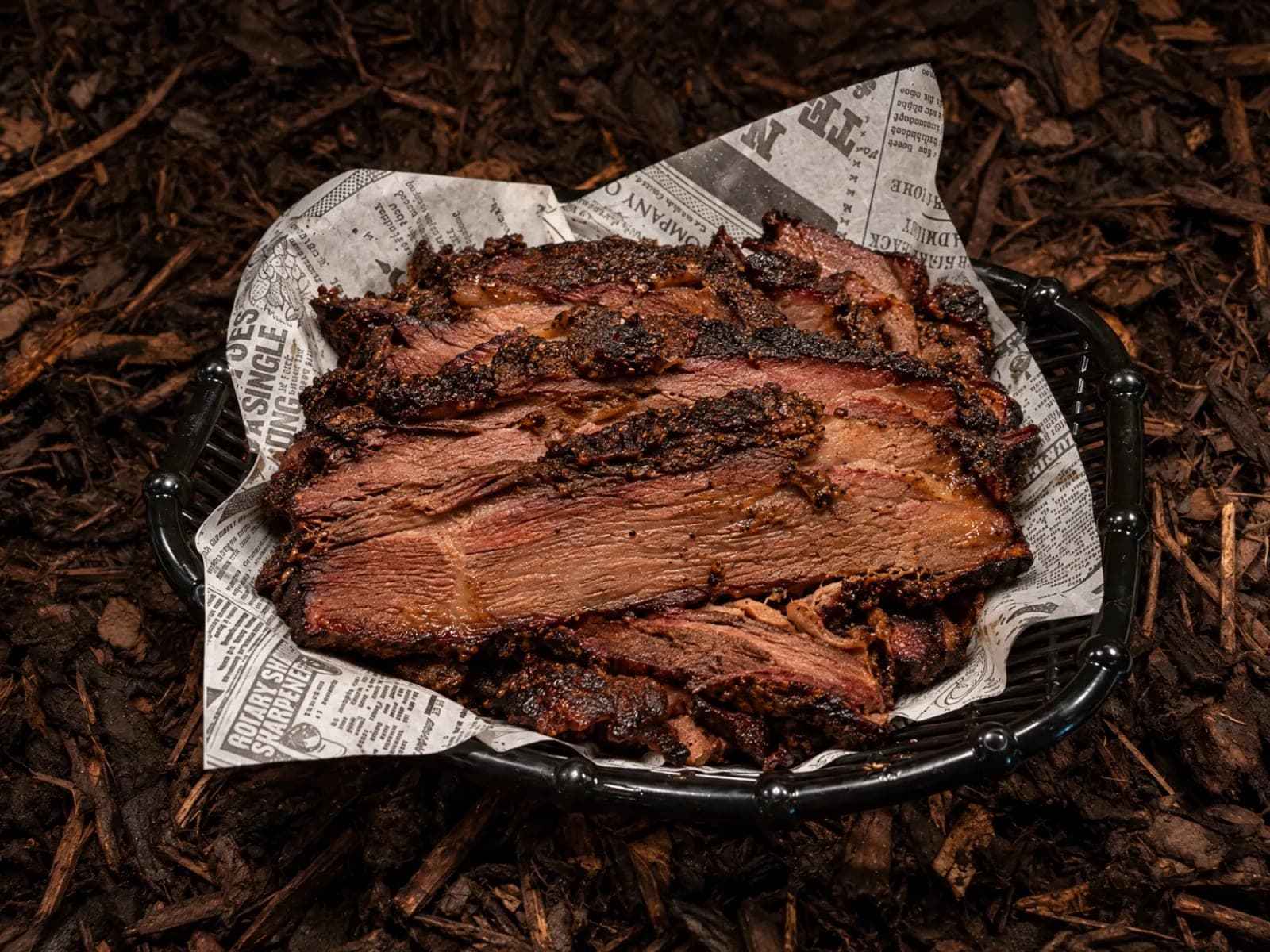 Sliced Street Bites smoked brisket with a peppery black bark