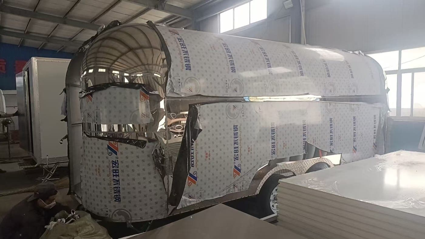 The front of the trailer being clad in stainless steel