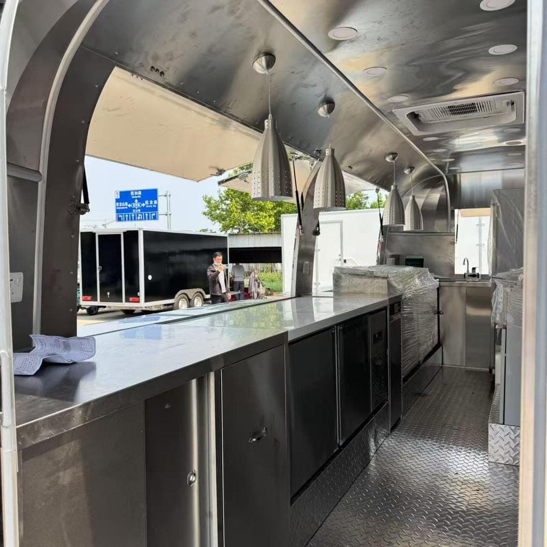 Stainless steel work surfaces and storage inside the finished trailer