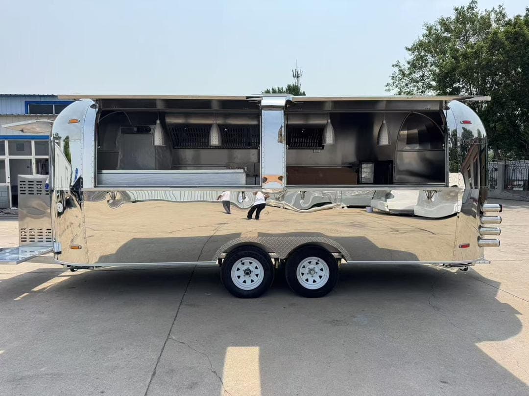 The trailer with its service hatches raised, ready for service